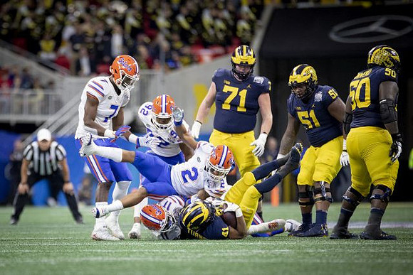 Christian Turner (41), Andrew Stueber (71), Cesar Ruiz (51), and Michael Onwenu (50)