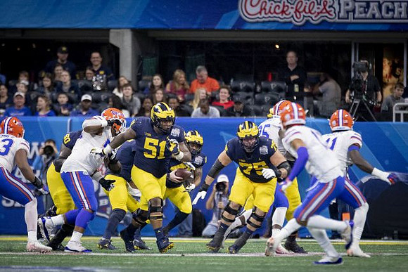 Michael Onwenu (50), Shea Patterson (2), Cesar Ruiz (51), Christian Turner (41), and Jon Runyan Jr. (75)