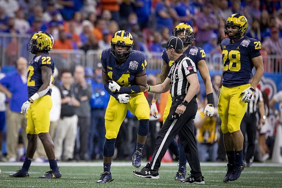 David Long (22), Josh Metellus (14), J'Marick Woods (26), and Brandon Watson (28)