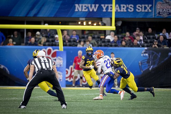 J'Marick Woods (26) and Josh Metellus (14)