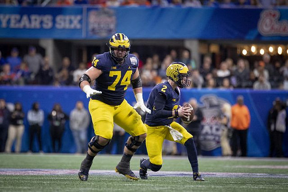 Ben Bredeson (74) and Shea Patterson (2)