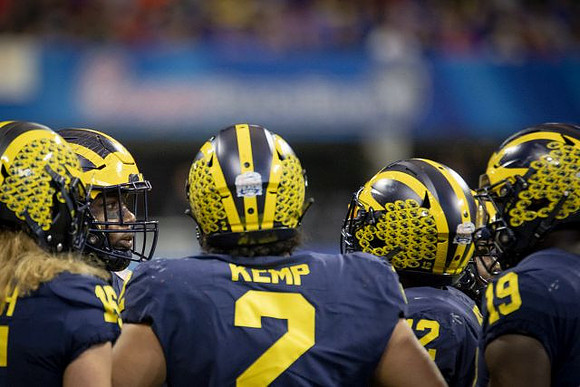 Chase Winovich (15), Carlo Kemp (2), Josh Ross (12), and Kwity Paye (19)