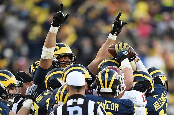 Chris Wormley (43), Frank Clark (57), Raymon Taylor (6), and Delonte Hollowell (24)