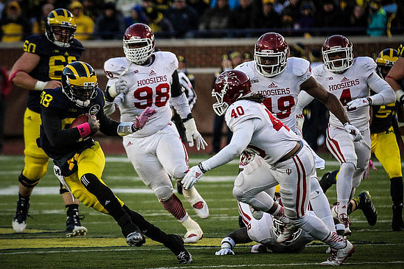 Jack Miller (60), Devin Gardner (98), and Justice Hayes (5)