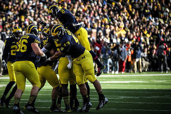 Ryan Glasgow (96), Jarrod Wilson (22), Joe Bolden (35), Frank Clark (57), Chris Wormley (43), and Blake Countess (2)