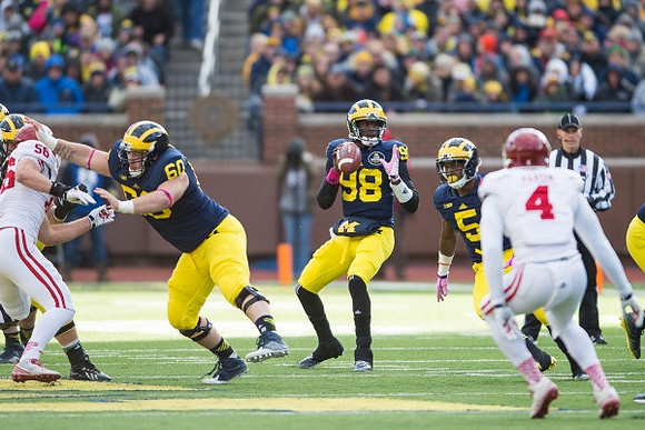 Jack Miller (60), Devin Gardner (98), and Justice Hayes (5)