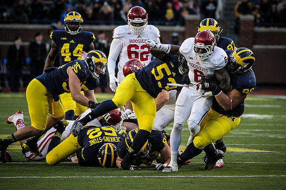 Delano Hill (44), Joe Bolden (35), Royce Jenkins-Stone (52), Mario Ojemudia (53), Brennen Beyer (97), and Bryan Mone (90)