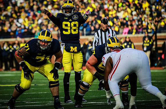 Ben Braden (71), Devin Gardner (98), and Kyle Kalis (67)