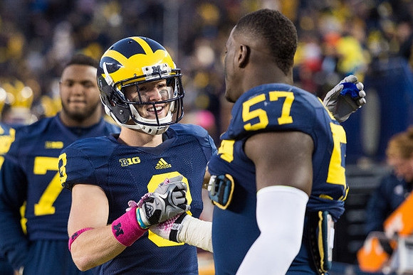 Bo Dever (3) and Frank Clark (57)