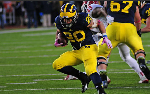 Drake Johnson (20) and Kyle Kalis (67)