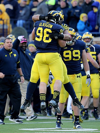 Brady Hoke, Ryan Glasgow (96), and Matthew Godin (99)