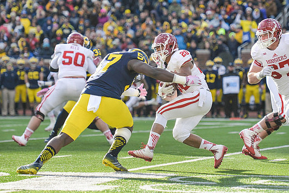 Taco Charlton (33) and Frank Clark (57)