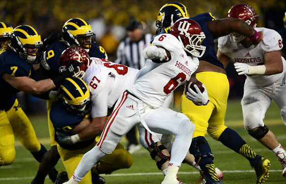 Henry Poggi (7), Mike McCray (9), and Ondre Pipkins (56)