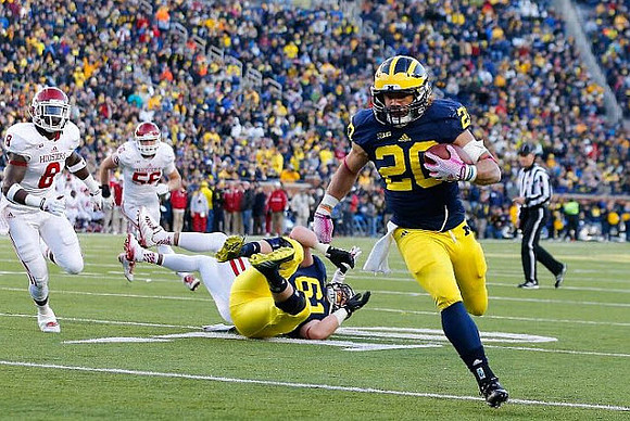 Graham Glasgow (61) and Drake Johnson (20)