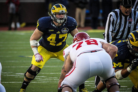 Jake Ryan (47) and Chris Wormley (43)
