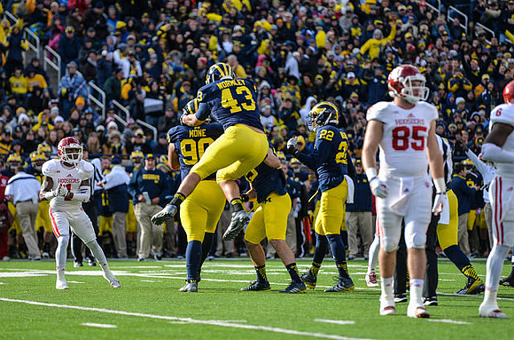 Bryan Mone (90), Chris Wormley (43), and Jarrod Wilson (22)