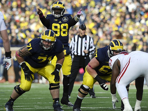 Ben Braden (71), Devin Gardner (98), and Kyle Kalis (67)