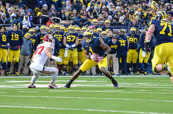 Devin Funchess (1) and Ben Braden (71)
