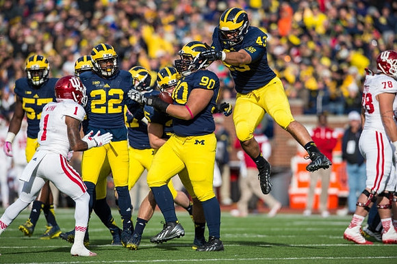 Frank Clark (57), Jarrod Wilson (22), Bryan Mone (90), and Chris Wormley (43)