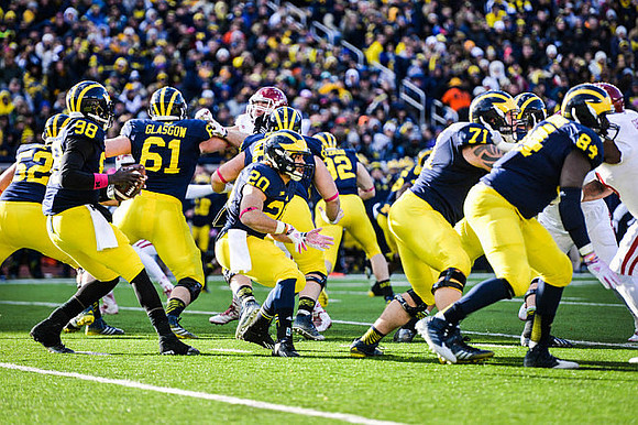 Mason Cole (52), Devin Gardner (98), Drake Johnson (20), Keith Heitzman (92), Ben Braden (71), and A.J. Williams (84)