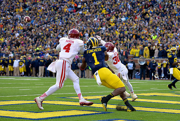 Devin Funchess (1) and Amara Darboh (82)