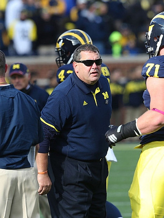Brady Hoke and Ben Braden (71)