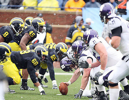 Mike Martin (68), Jonas Mouton (8), Obi Ezeh (45), and Brandon Graham (55)