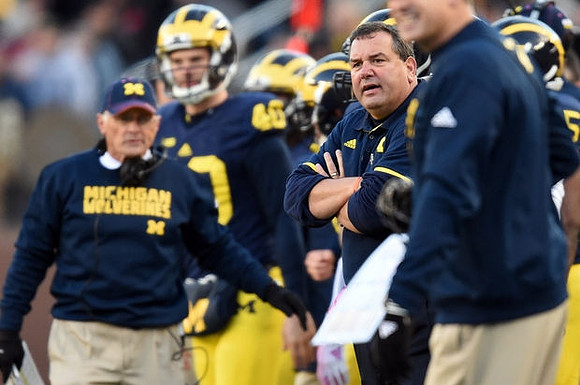 Dan Ferrigno, Joe Hewlett (46), and Brady Hoke