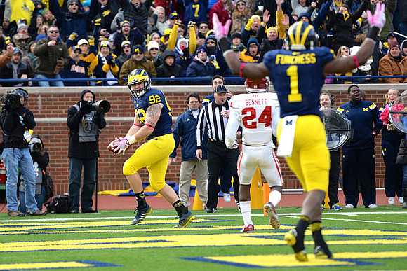 Keith Heitzman (92) and Devin Funchess (1)