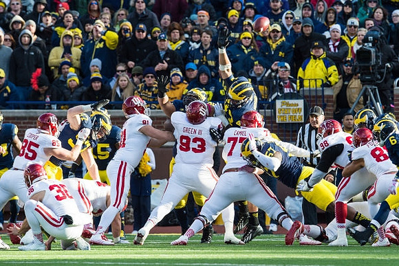 Brennen Beyer (97), Joe Bolden (35), Chris Wormley (43), Frank Clark (57), and Raymon Taylor (6)
