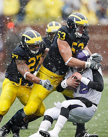 Brandon Harrison (27) and Ryan Van Bergen (53)