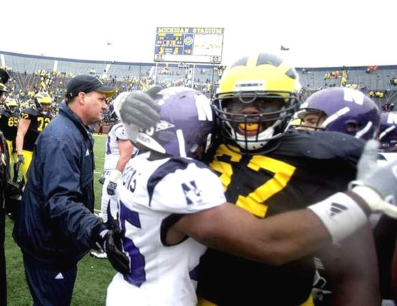 Patrick Omameh (65), Mark Huyge (72), Rich Rodriguez, and Terrance Taylor (67)