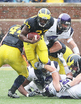 Mark Moundros (44) and Carlos Brown (23)