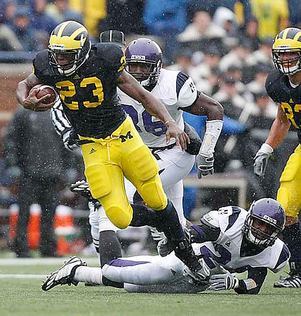 Carlos Brown (23) and LaTerryal Savoy (82)