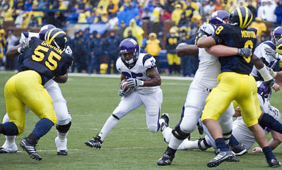 Brandon Graham (55) and Jonas Mouton (8)