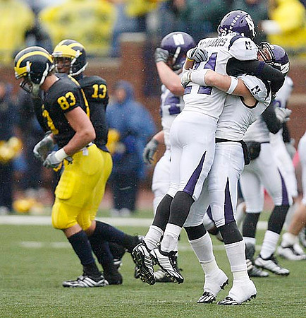 Mike Massey (83) and Greg Mathews (13)