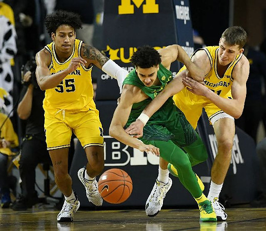 Eli Brooks (55) and Franz Wagner (21)