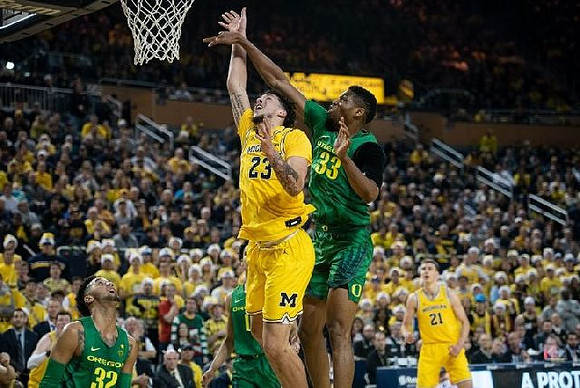 Brandon Johns Jr. (23) and Franz Wagner (21)