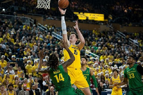 Jon Teske (15) and Eli Brooks (55)