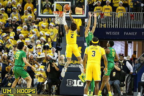 Isaiah Livers (2) and Zavier Simpson (3)