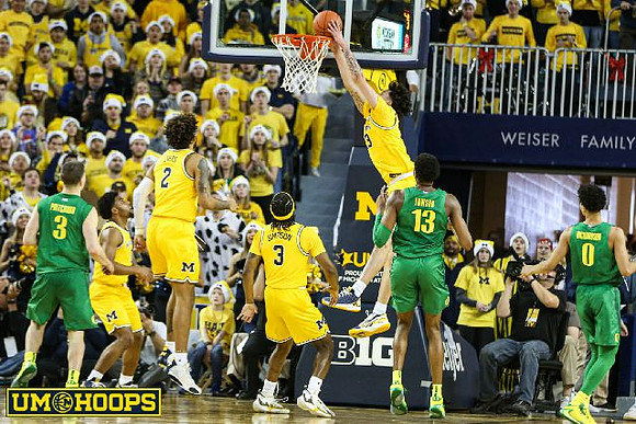 David DeJulius (0), Isaiah Livers (2), Zavier Simpson (3), and Brandon Johns Jr. (23)