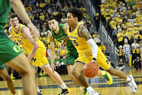 Jon Teske (15) and Eli Brooks (55)