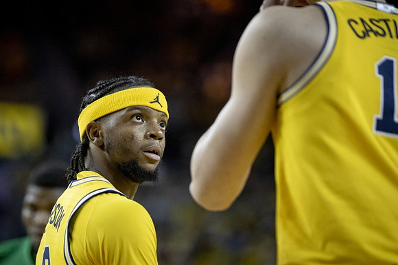 Zavier Simpson (3) and Colin Castleton (11)