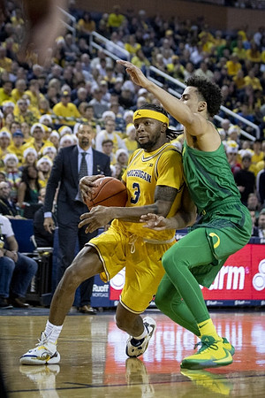 Juwan Howard and Zavier Simpson (3)