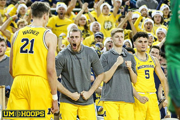 Franz Wagner (21), Austin Davis (51), Luke Wilson (32), and Adrien Nunez (5)