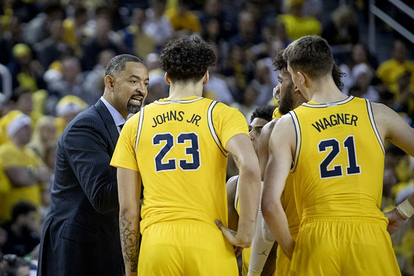 Juwan Howard, Brandon Johns Jr. (23), David DeJulius (0), Isaiah Livers (2), and Franz Wagner (21)