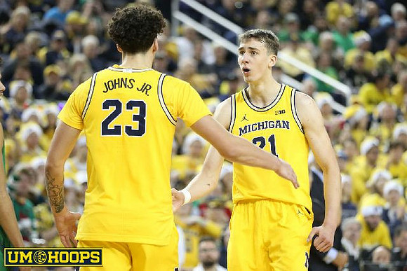 Brandon Johns Jr. (23) and Franz Wagner (21)