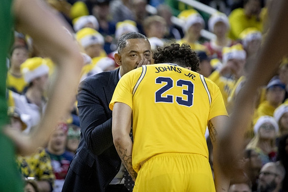 Juwan Howard and Brandon Johns Jr. (23)