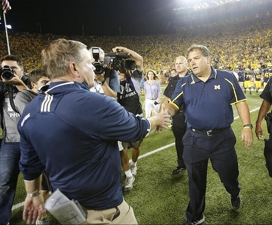 Notre Dame Head Coach Brian Kelly and Brady Hoke