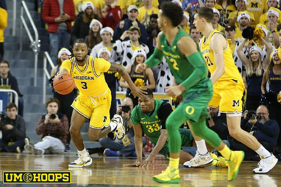 Zavier Simpson (3) and Franz Wagner (21)